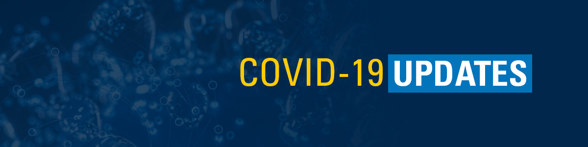 Text reading COVID-19 Updates in gold and white text on dark blue background with pattern of COVID virus 