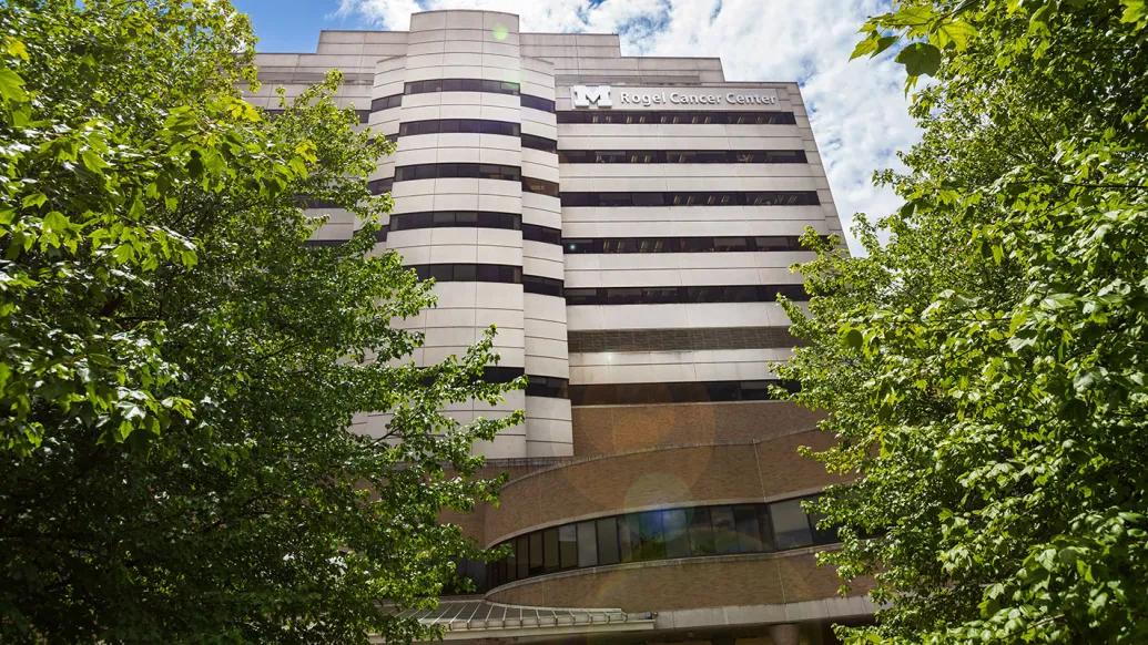 Rogel Cancer Center through trees