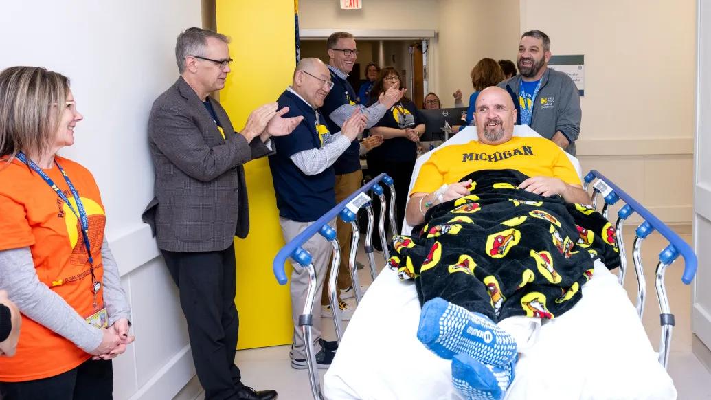 Craig Campbell moved to his new bed in the D. Dan and Betty Kahn Health Care Pavilion