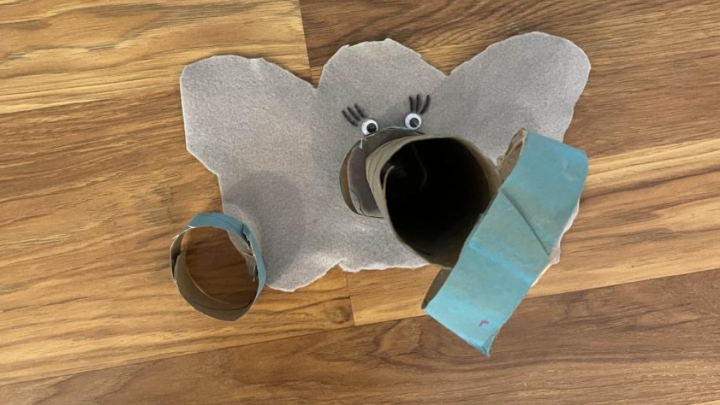 Elephant shape face on the piece of felt or heavy paper