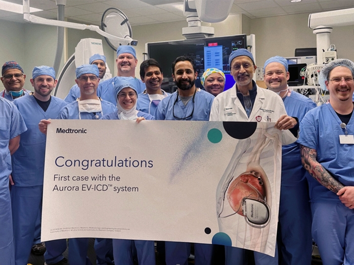 Ali Sheikh, D.O., celebrates with Sparrow’s highly skilled cardiovascular team after becoming the first health system in Michigan to implant the innovative Aurora EV-ICD device defibrillator.