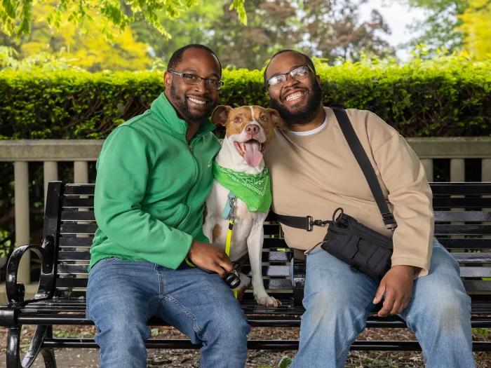 Keshawn Spencer (pictured right) enjoying a local park alongside his partner, Casey, and dog, Bradley.