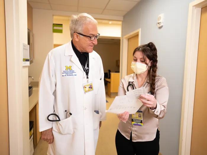Mott Pediatric Pulmonology Physician Consult between an attending and a trainee
