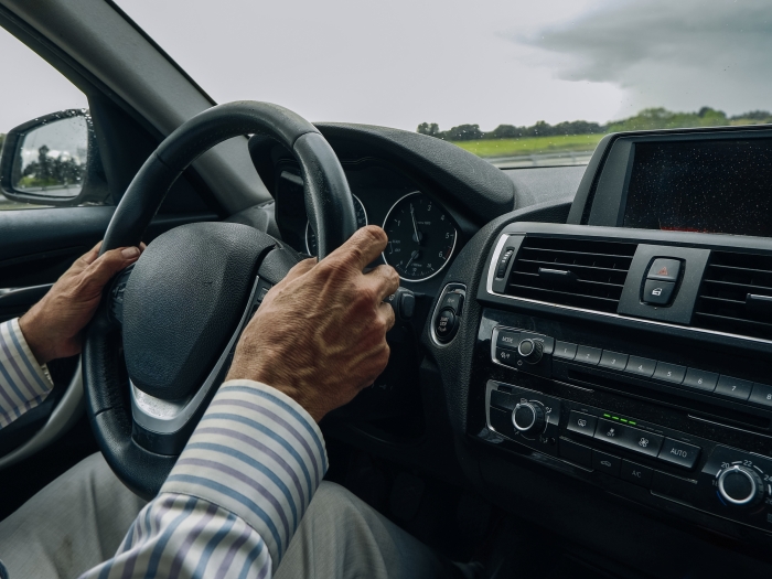 hands on steering wheel