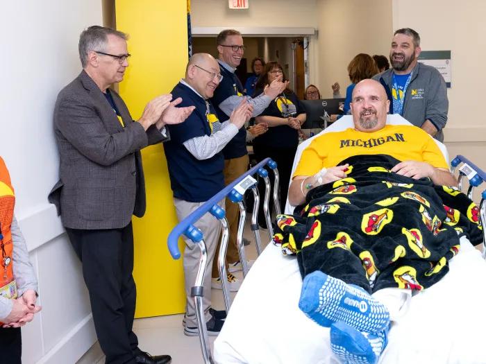 Craig Campbell moved to his new bed in the D. Dan and Betty Kahn Health Care Pavilion