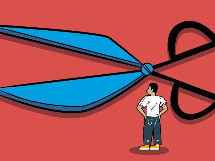 large scissors blue on red background with guy looking at it deciding 