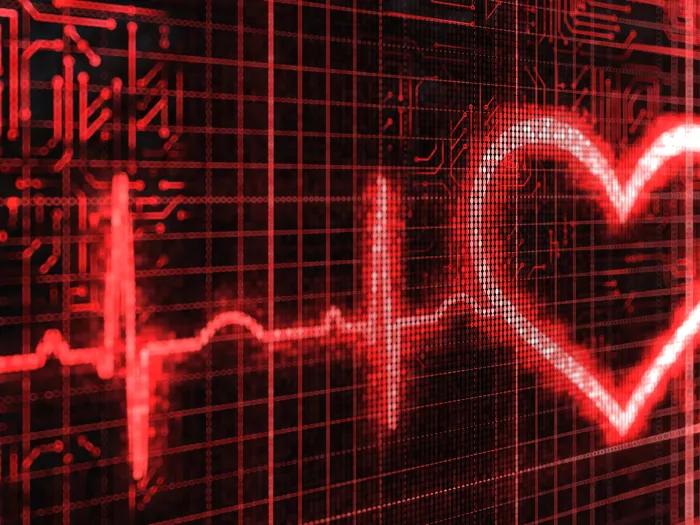 heart on monitor heart symbol black background neon red lines