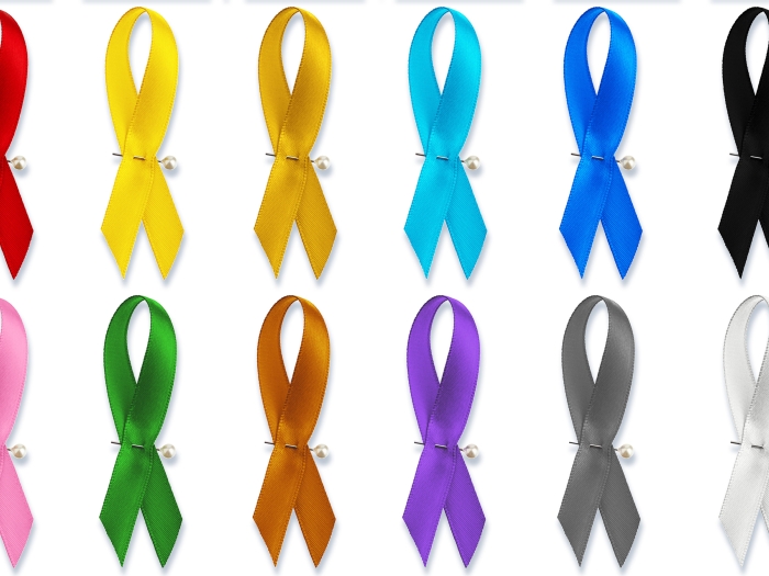 ribbons in colorful colors lined up next to eachother