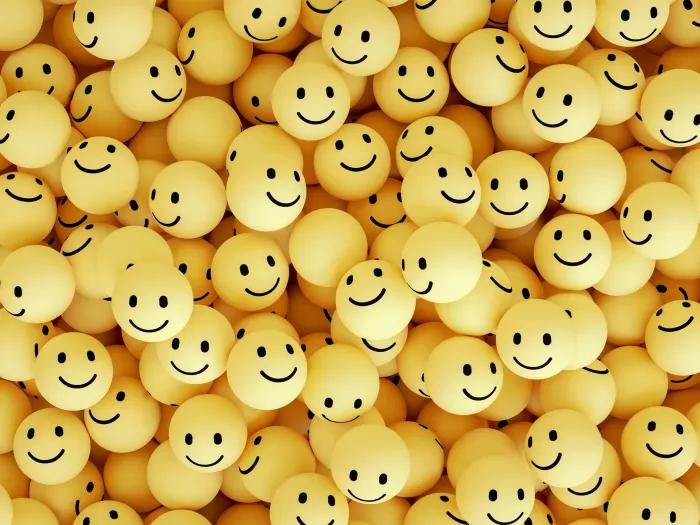 hundreds of yellow smiley face balls