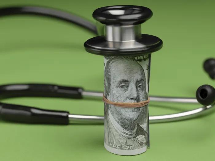 stethoscope money wrapped around it
