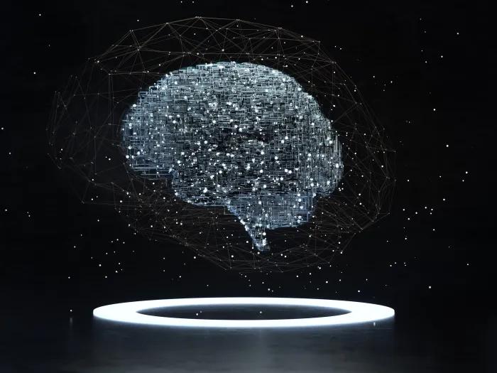 black background and white specs forming a brain floating with light ring under the brain
