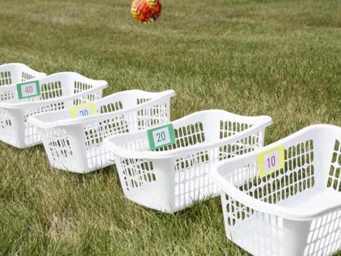 Ball being tossed in white basket