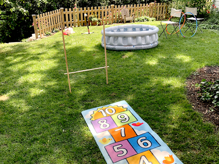 hopscotch table, hulu hoops, pool obstacle in yard
