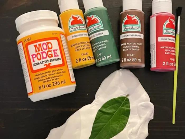 Different color clays in plastic bottles.