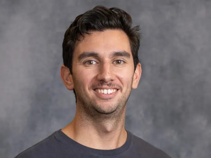 headshot of John Larson