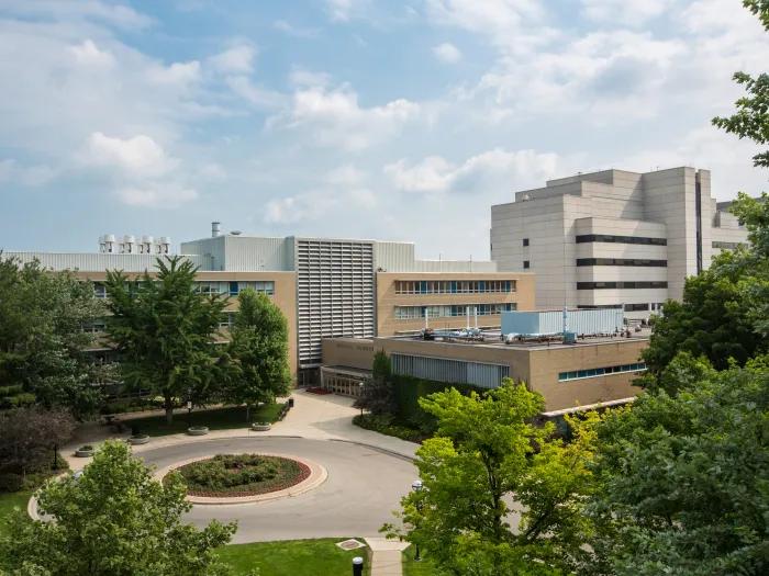 A view of the U-M Medical School and surrounding buildings on a partly sunny day.