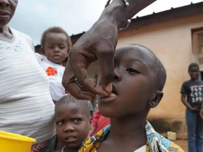 Child getting ivermectin treatment for river blindness