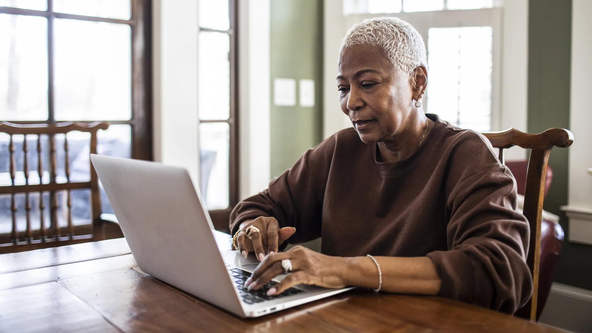 older woman on laptop