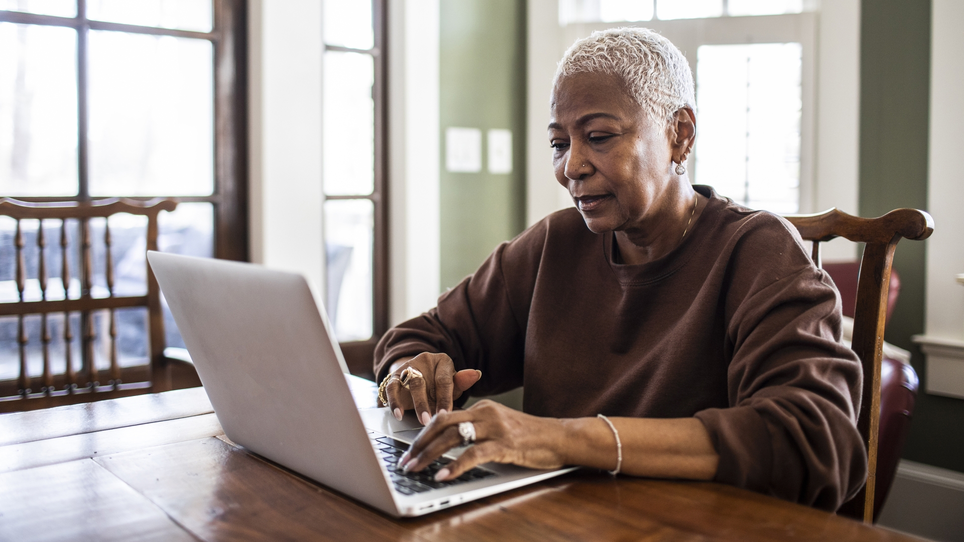 older woman on laptop
