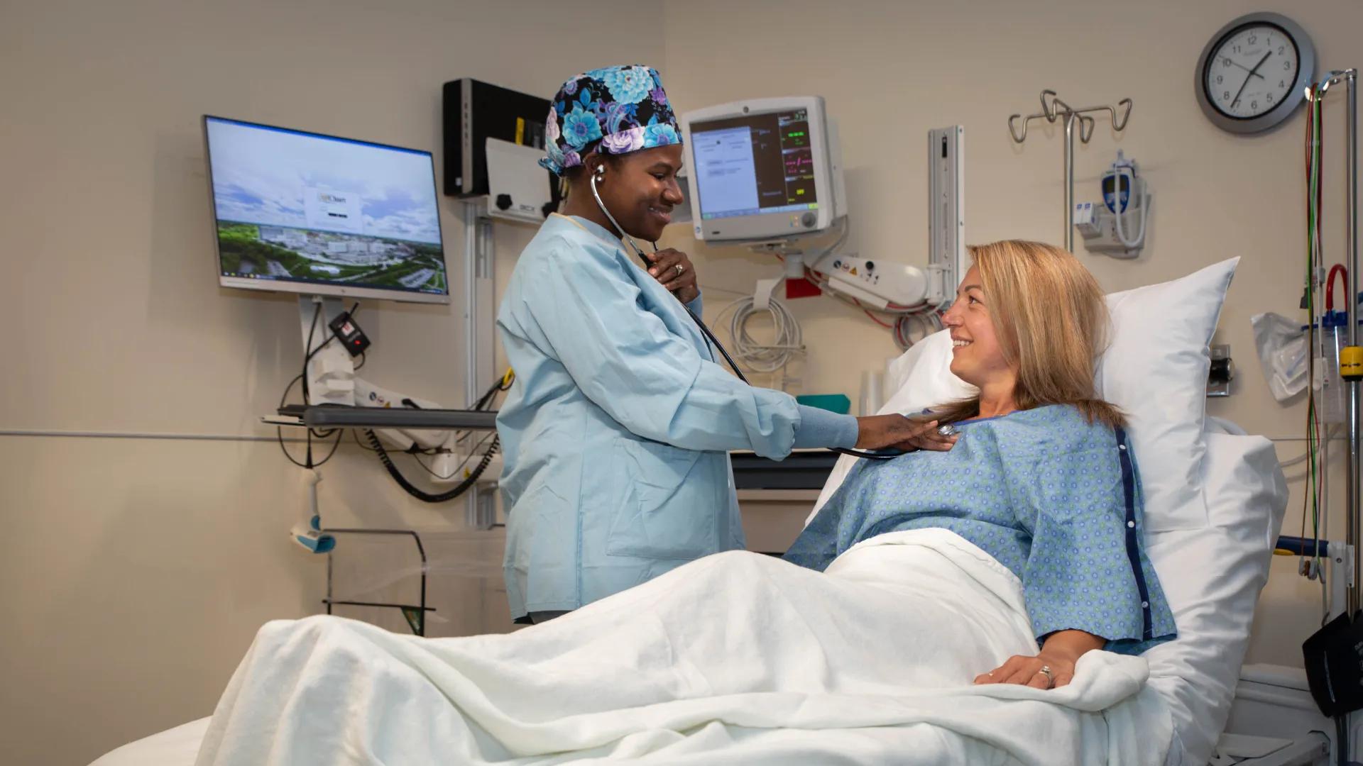 wide angle view of doctor taking vitals on patient 