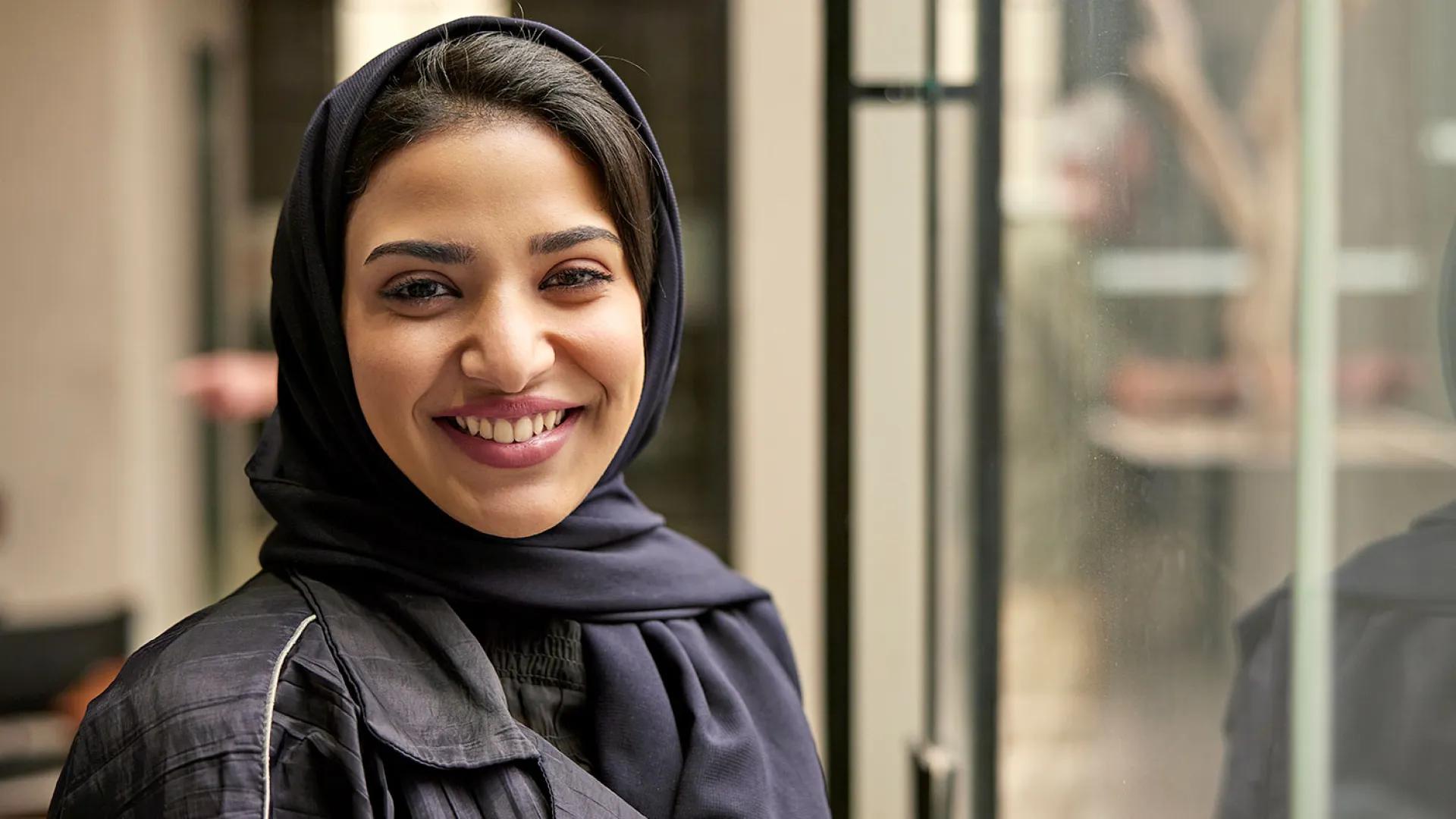 Young adult, Muslim woman smiling