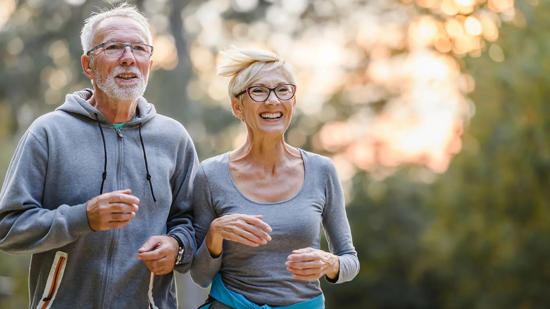 Mature couple walking together for excercise