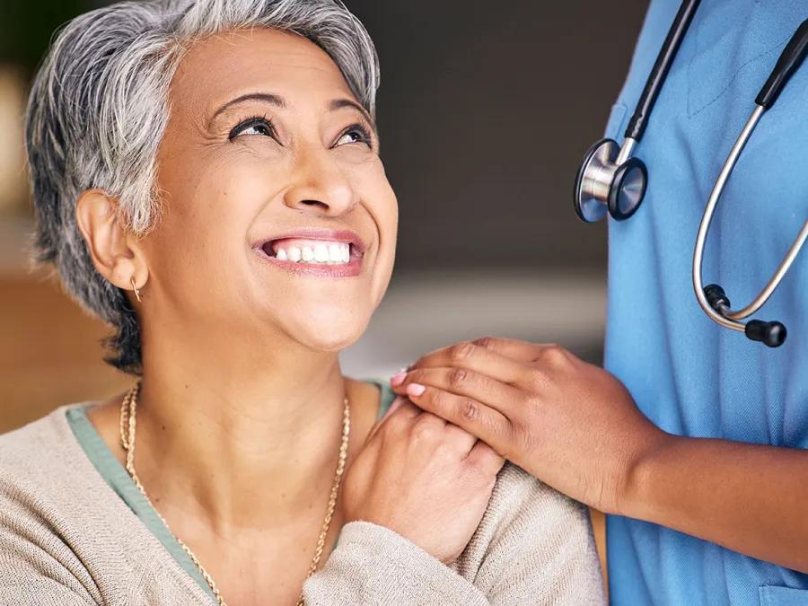 Mature woman with nurse