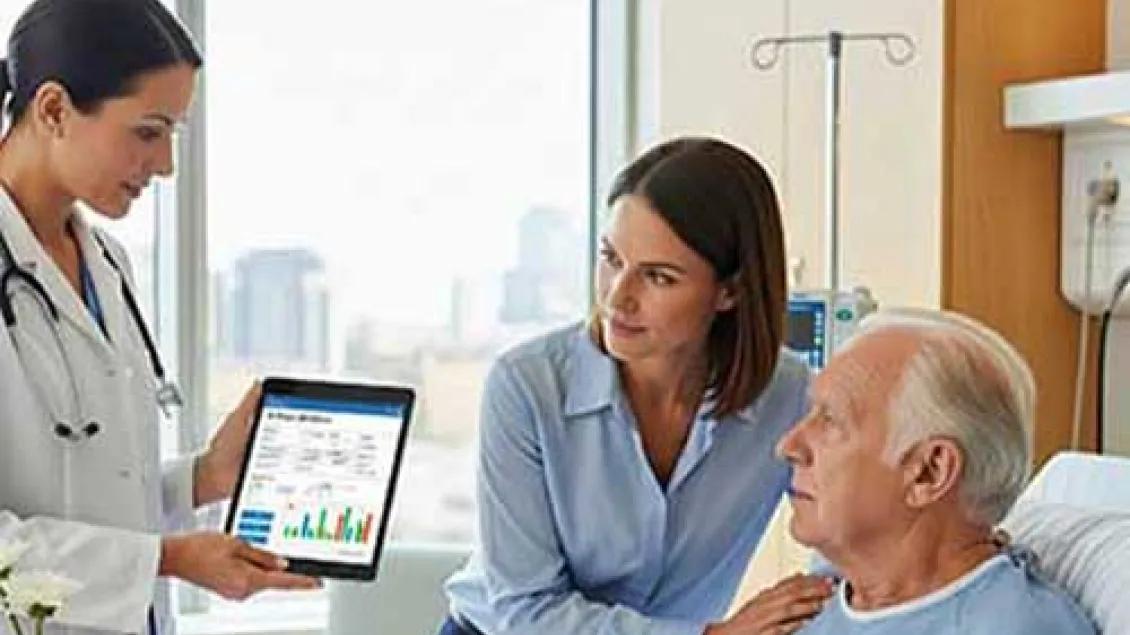 a patient and family member looks at health information on a physicians tablet