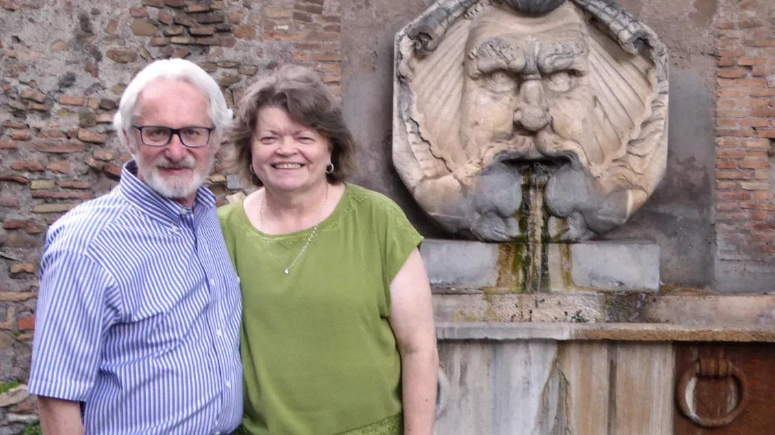 man and woman smiling 
