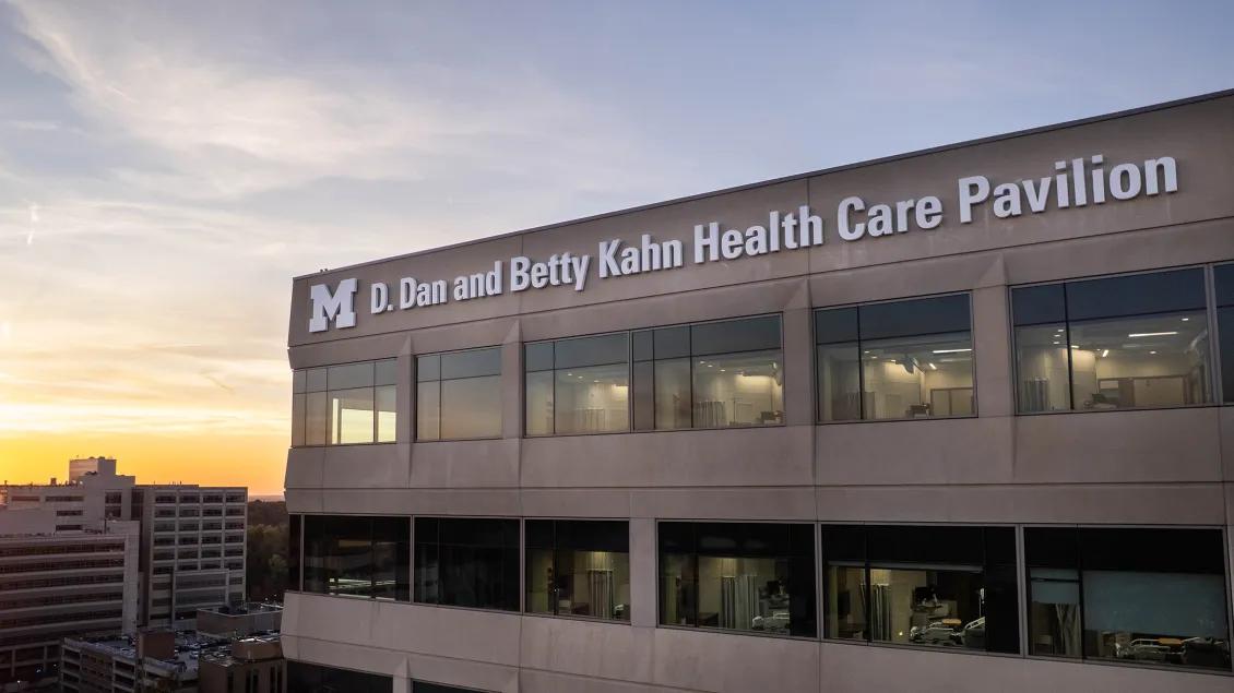 D Dan and Betty Kahn Health Care Pavilion at sunset with name on building