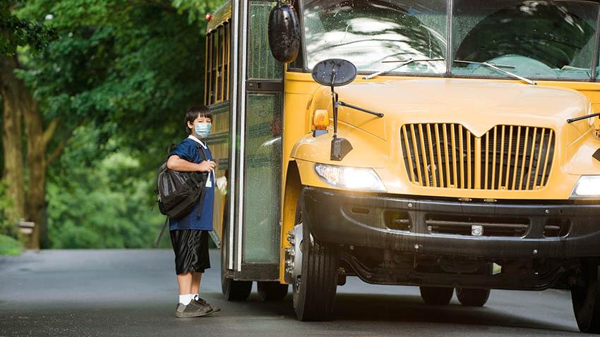 Kid going to school during COVID pandemic