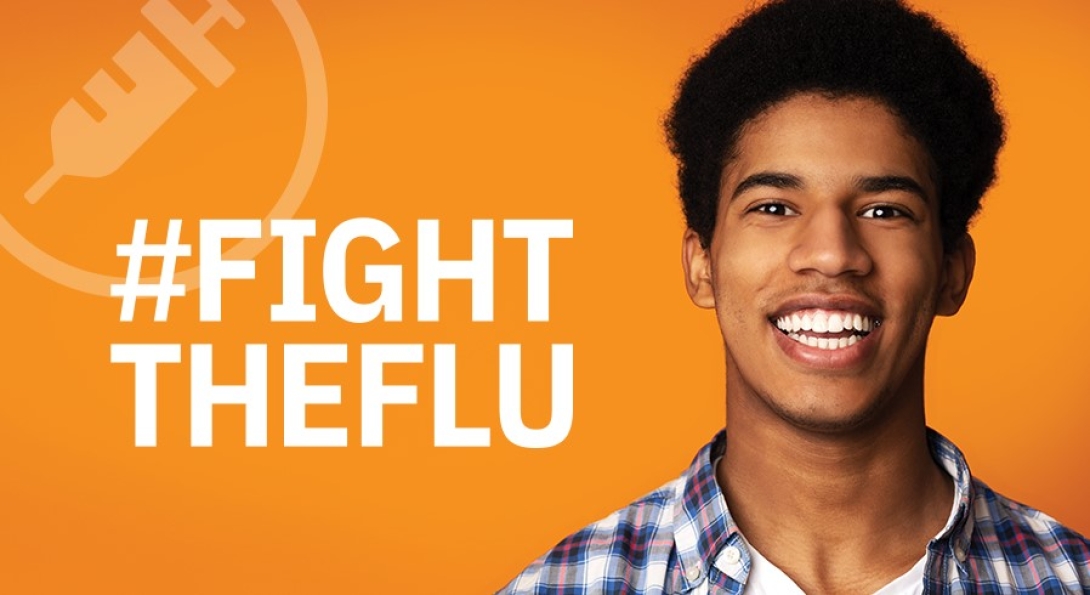 "fight the flu" next to young man smiling