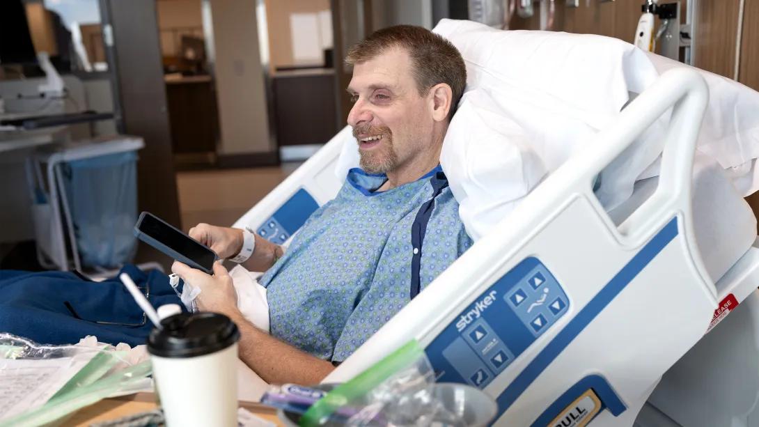 The hospital's first patient, Norman Ringkvist, settles into his room after the move.