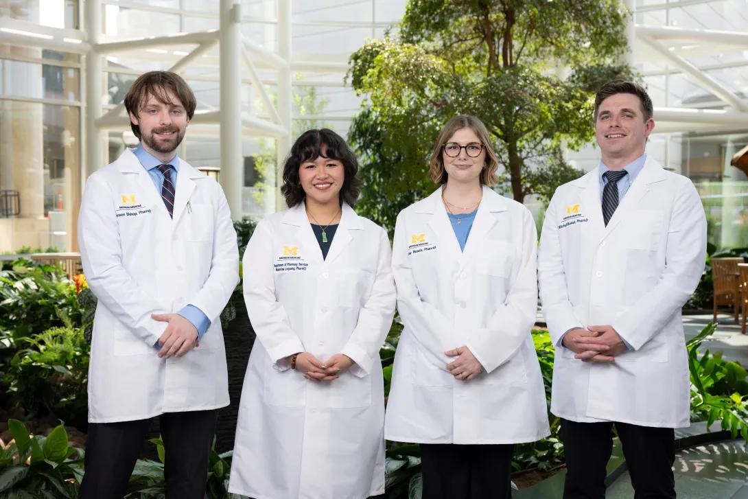 Group photo of 4 people