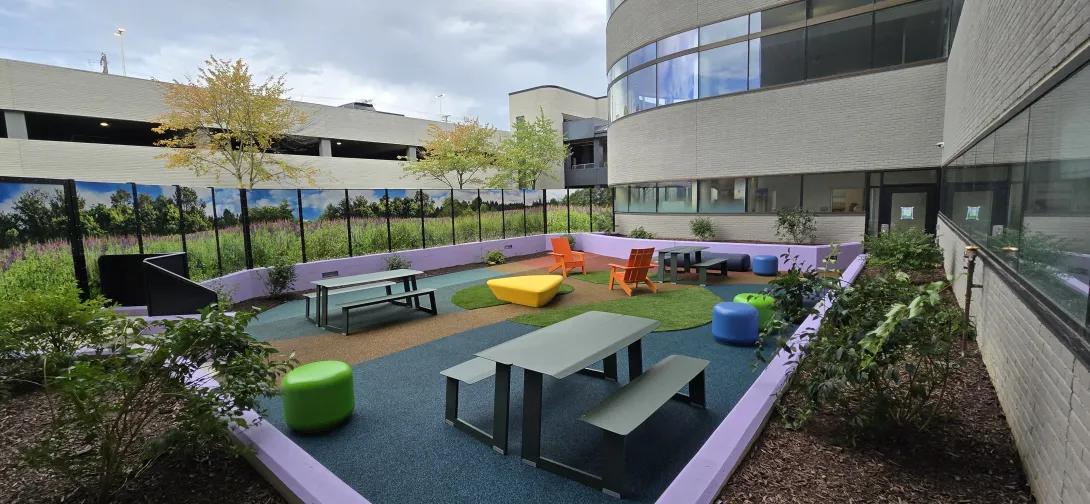 Courtyard for the youth program with picnic tables and more