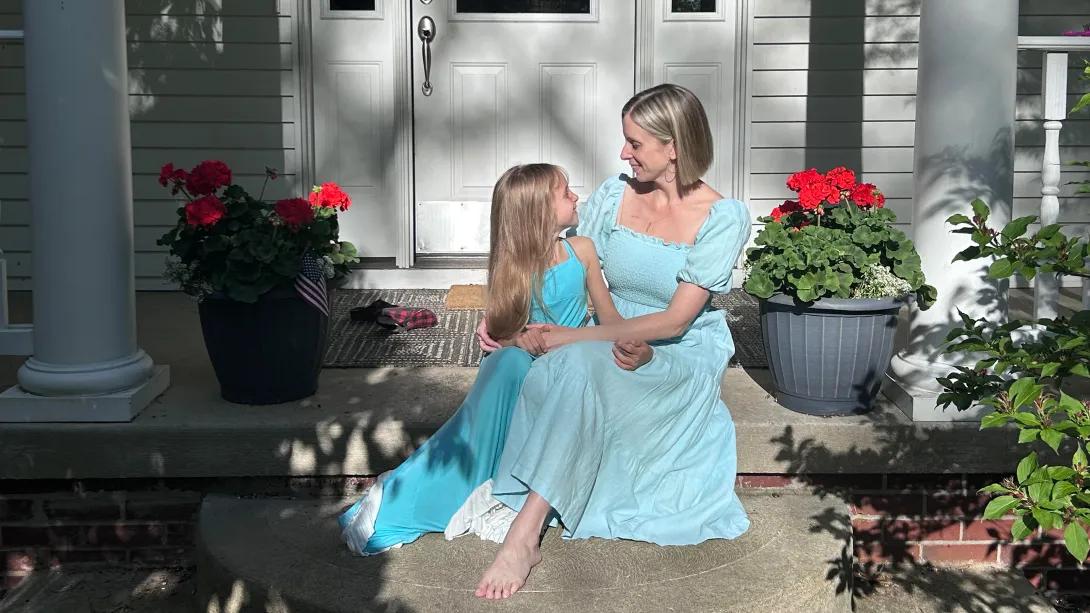 Moravek with one of her daughters.